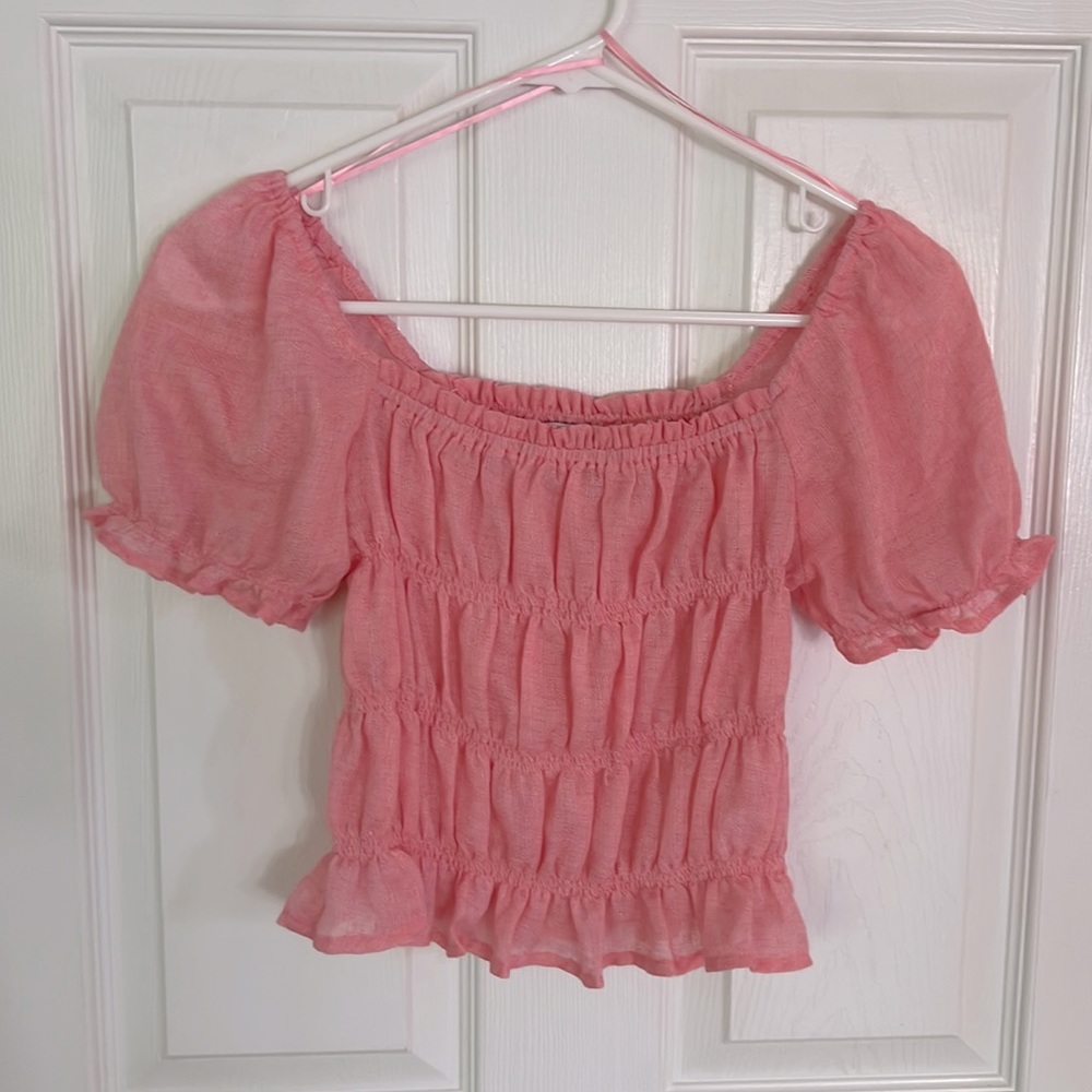 Perfect condition.  Favlux ruched top.